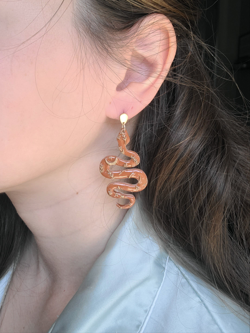 Terracotta and bronze snakes