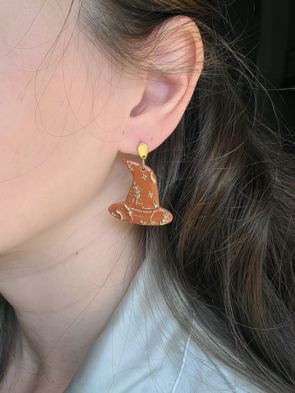 Terracotta and gold witch hats