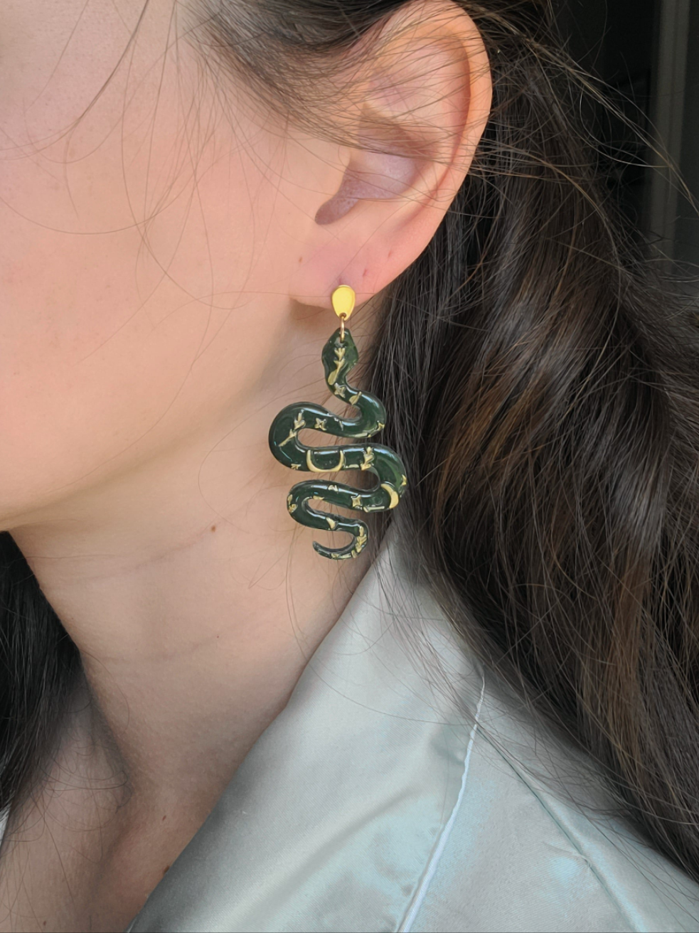 Green and gold textured snakes