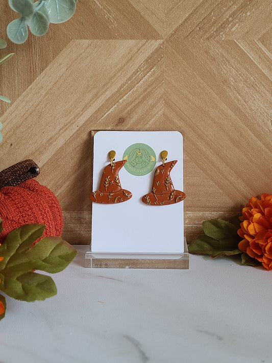 Terracotta and gold witch hats