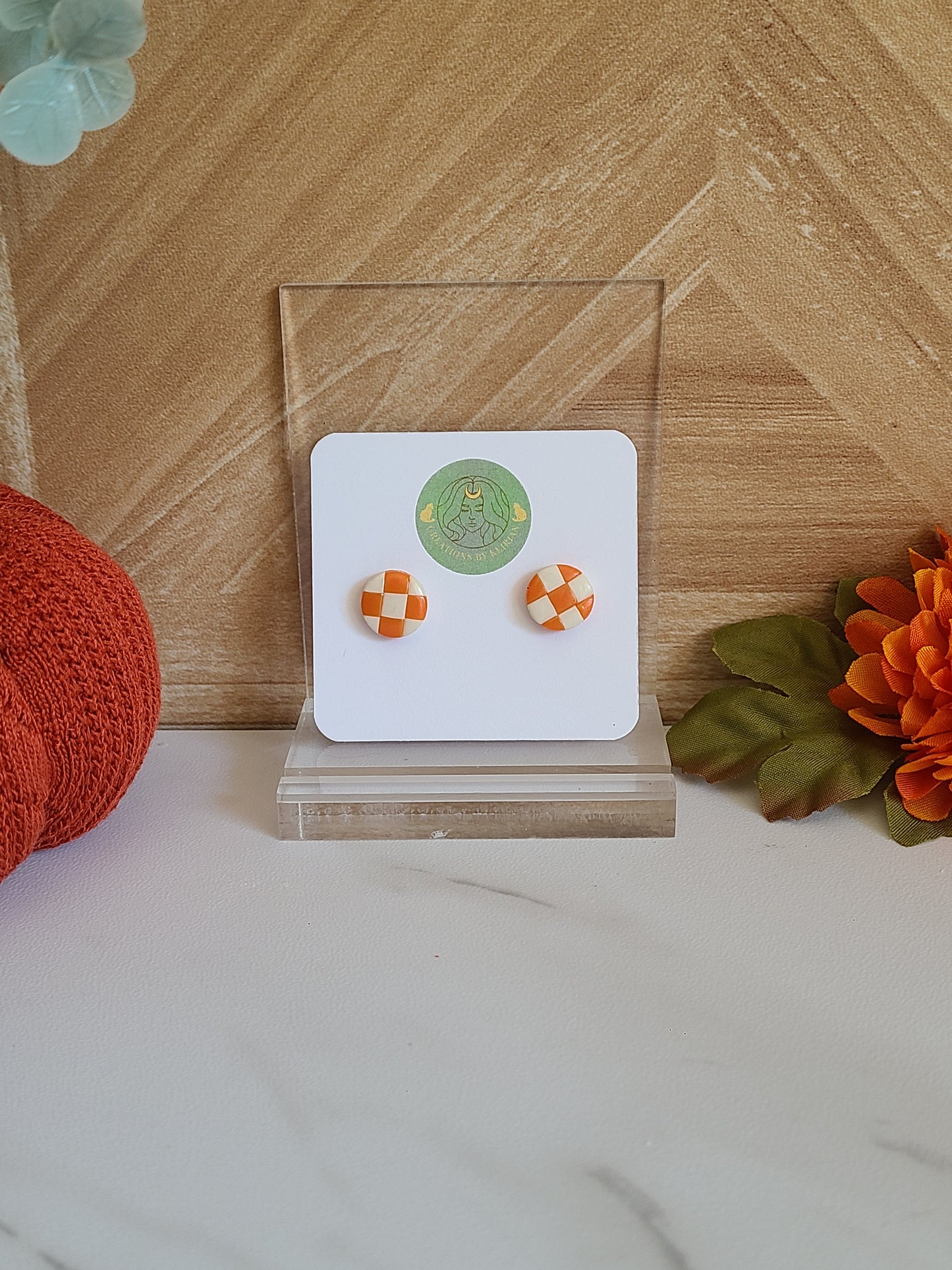 Orange and white checkered studs